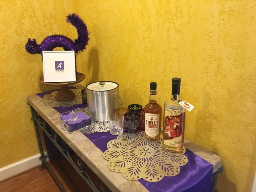 A table from the launch party with fox-related whiskey on it.